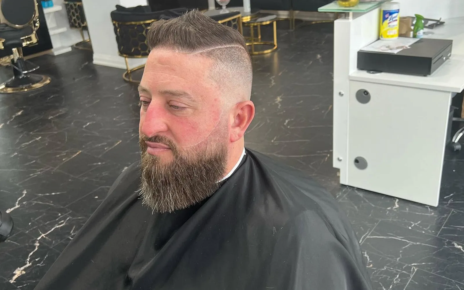 Client with a freshly shaped and lined beard