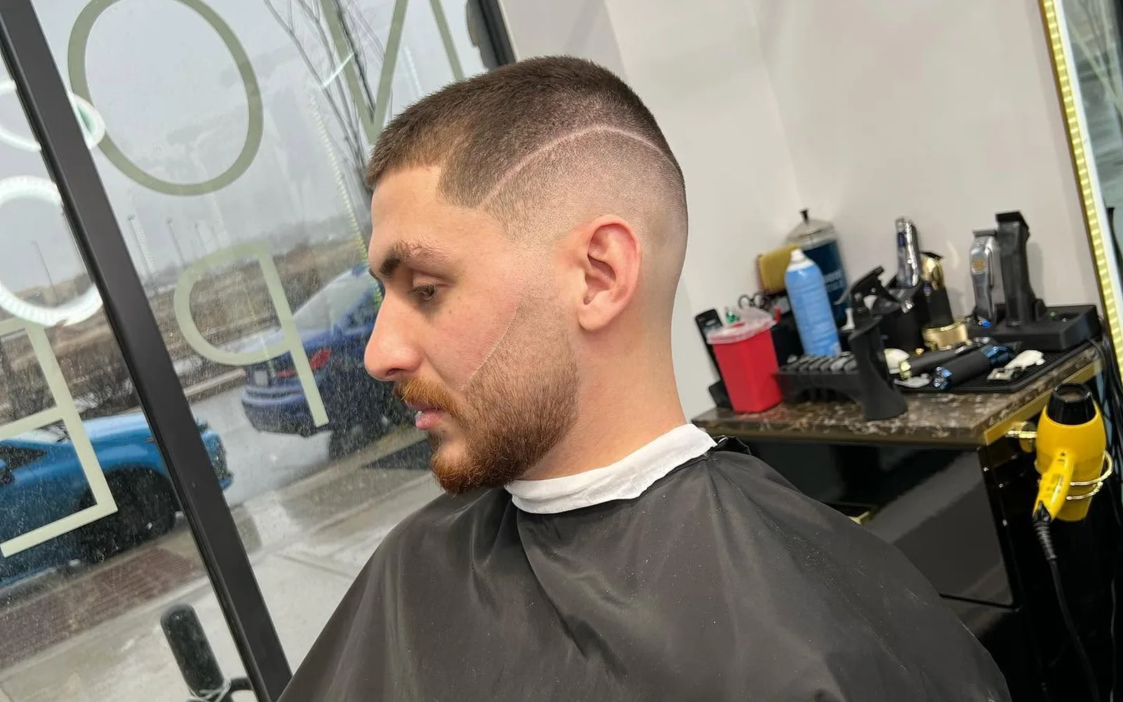 Client with a fresh haircut and groomed beard
