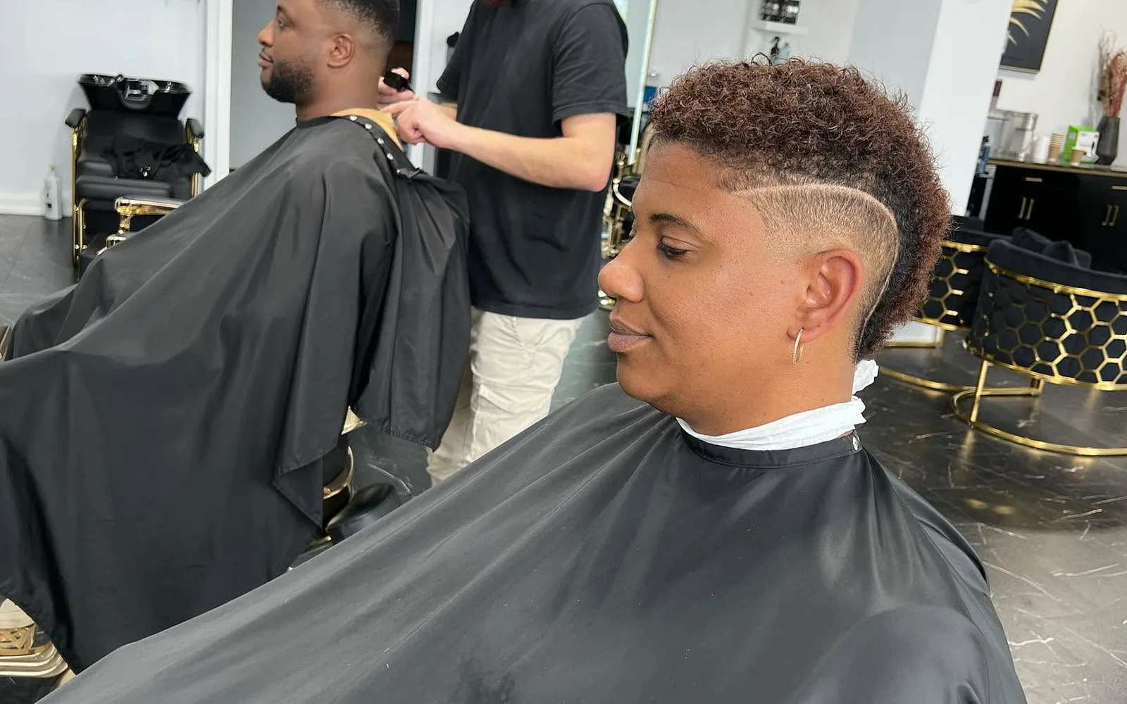 Close-up of a skin fade being blended