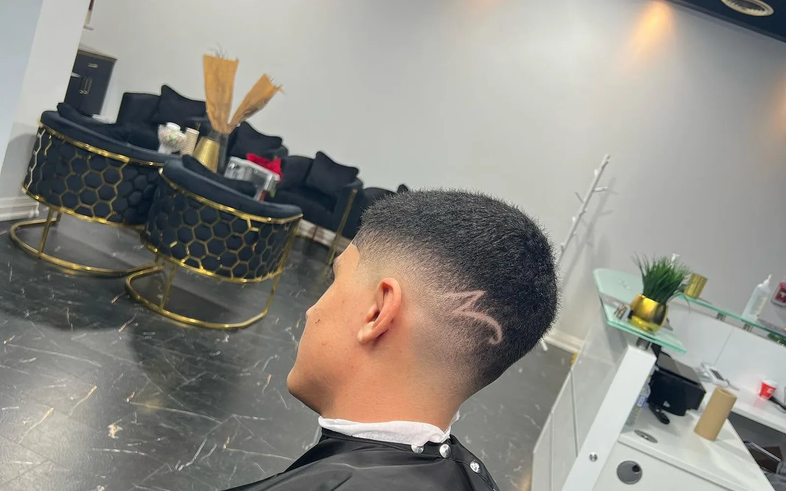 Side view of a tightly blended fade haircut