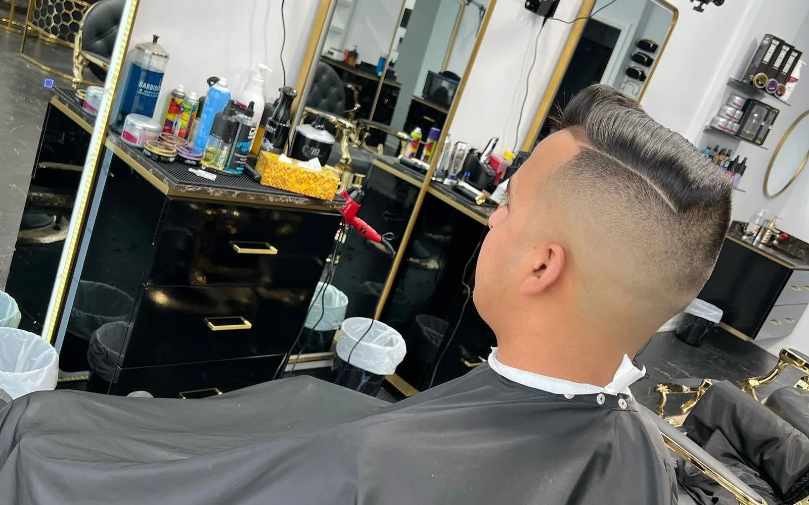 Professional profile photo of a precision fade and beard
