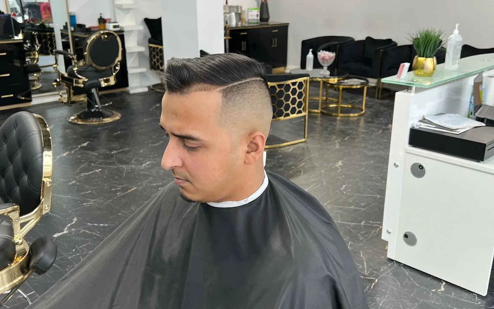 Side profile of a fresh men's haircut at S Blends